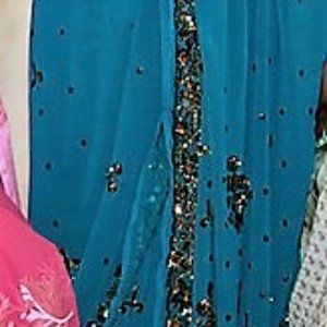 Teal blue georgette saree with copper sequin work